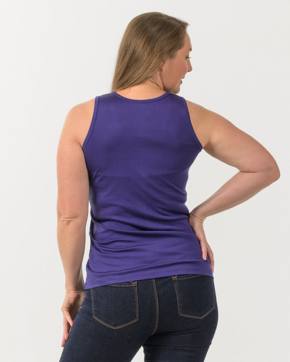 Person wearing a silk  purple tank top 