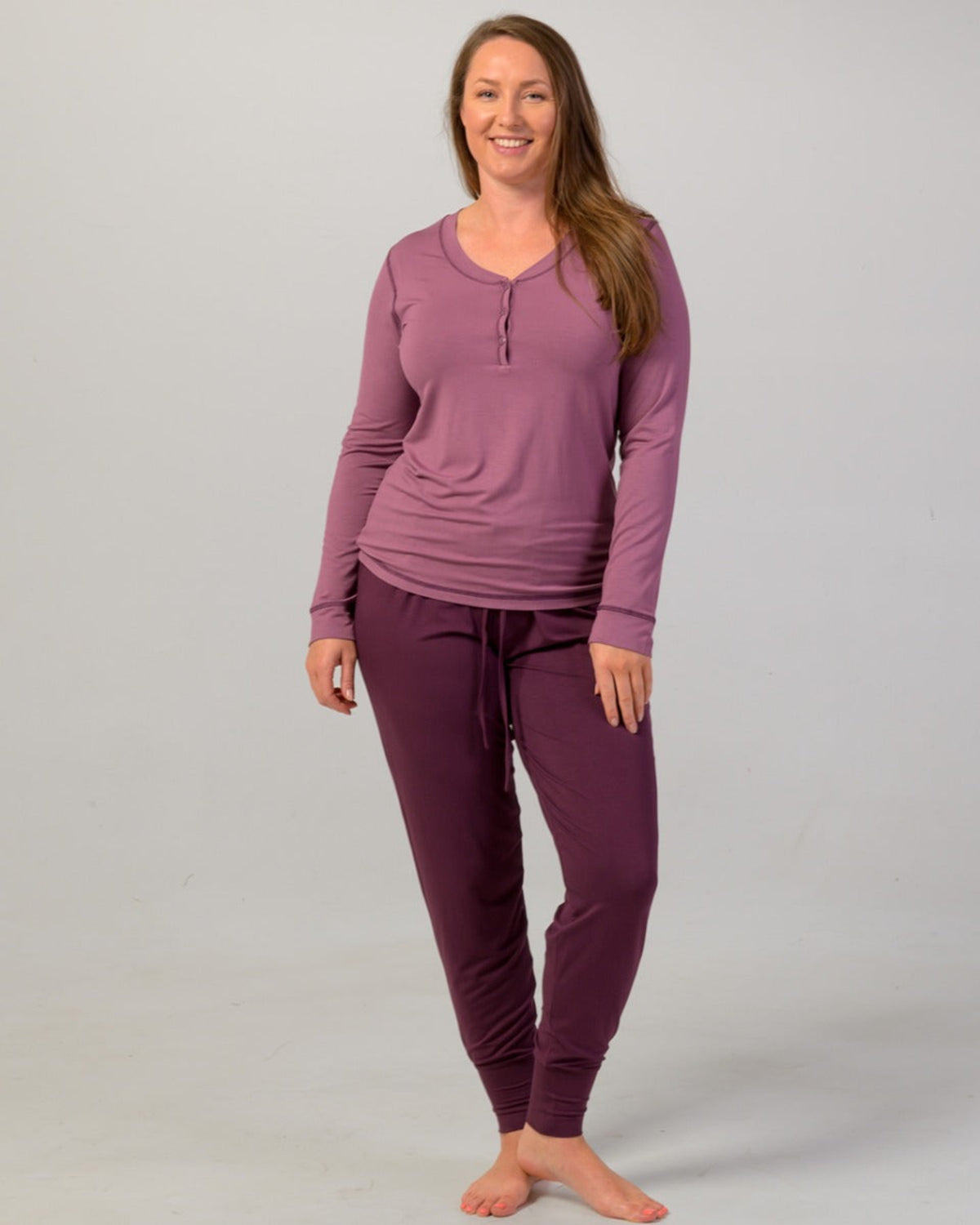 Woman wearing a orchid haze long-sleeve pajama top bamboo