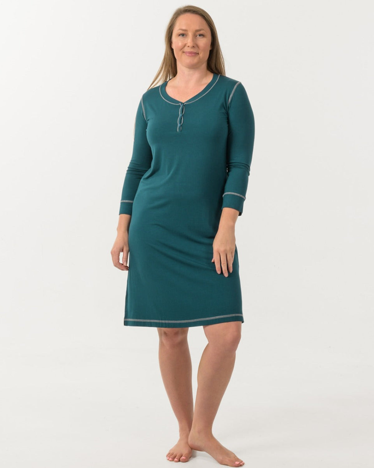 Woman wearing a teal bamboo henley nightshirt 