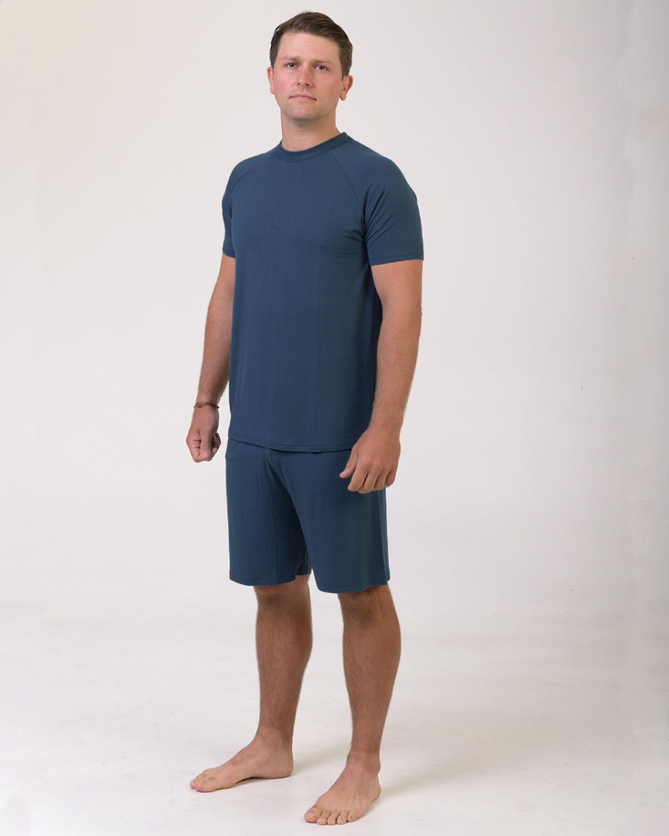 bamboo Man wearing a blue t-shirt and shorts set on a white background