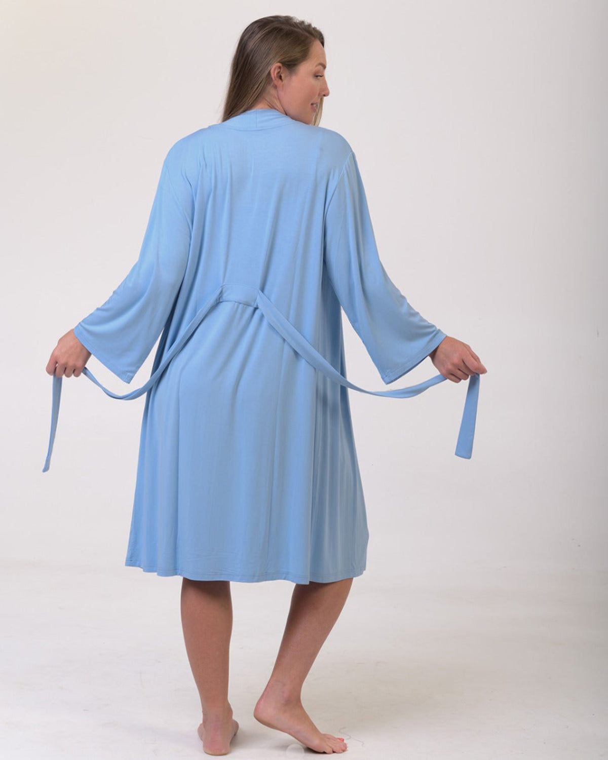 Woman wearing a  bamboo knee length robe 