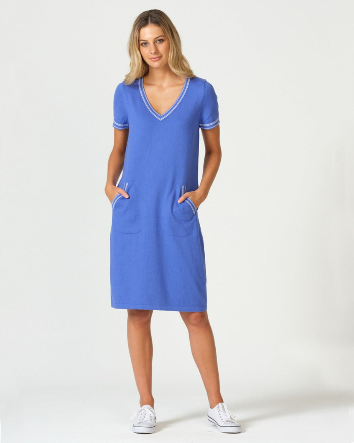 Woman wearing a vee neck optimum cotton dress 
