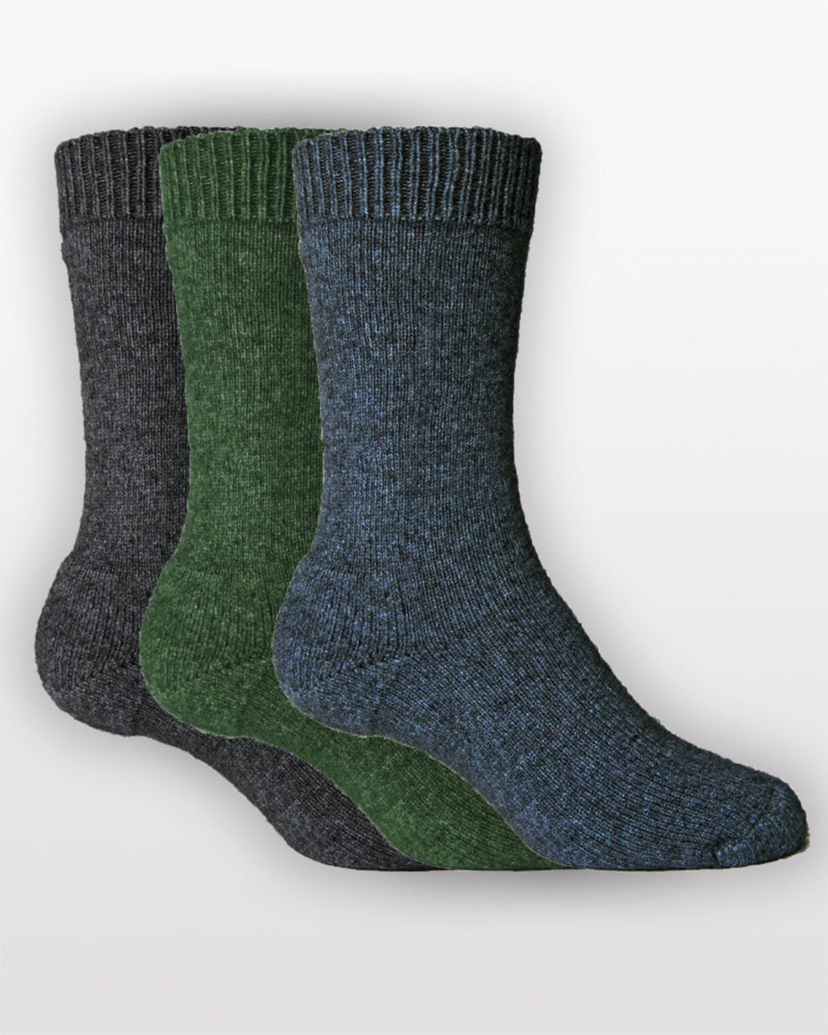 Three pairs of Possum Merino socks in gray, green, and blue on a white background