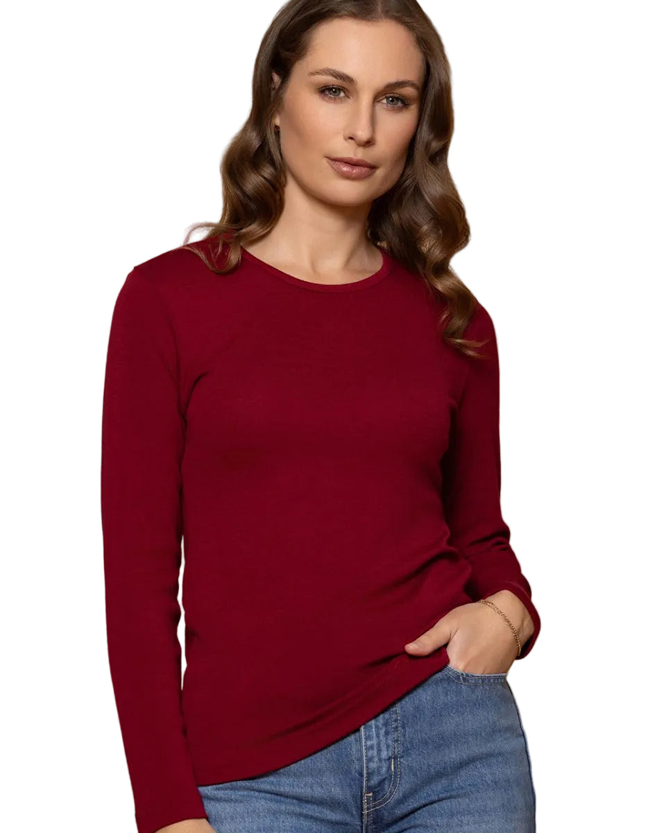 Woman wearing a merino long sleeve crew top