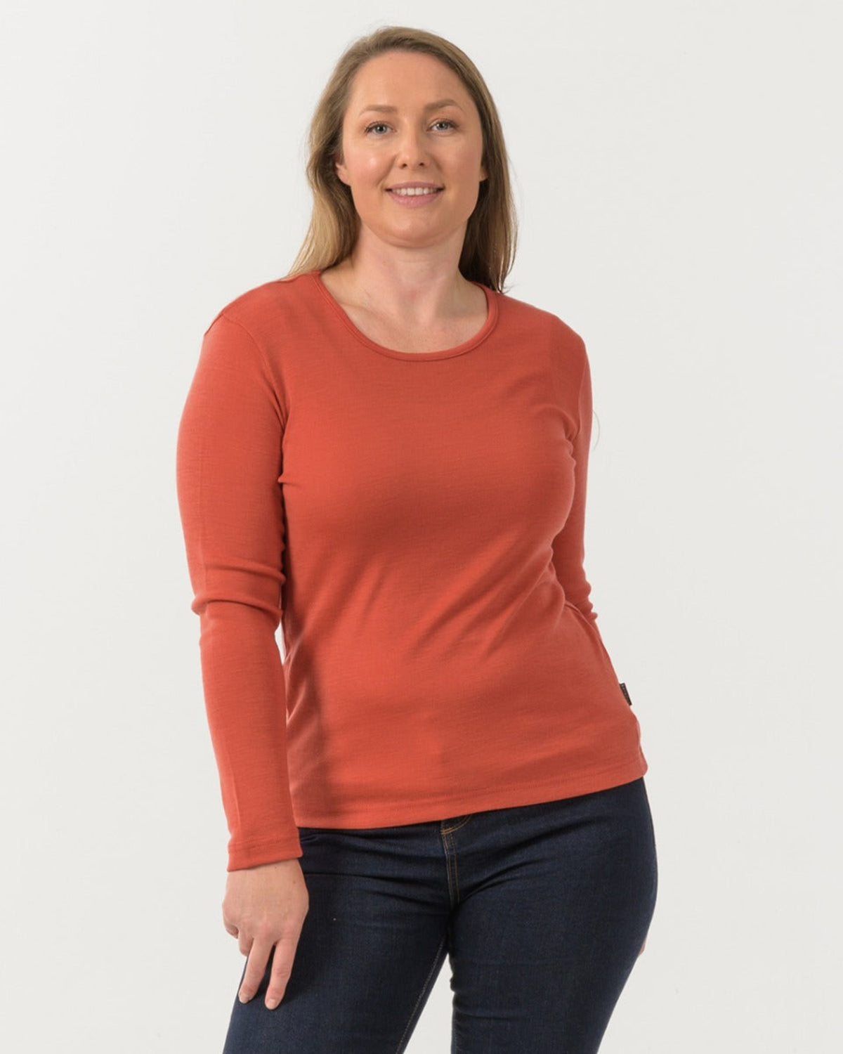 Woman wearing a merino long sleeve crew top