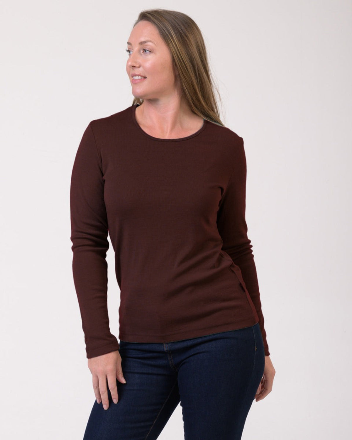 Woman wearing a merino long sleeve crew top