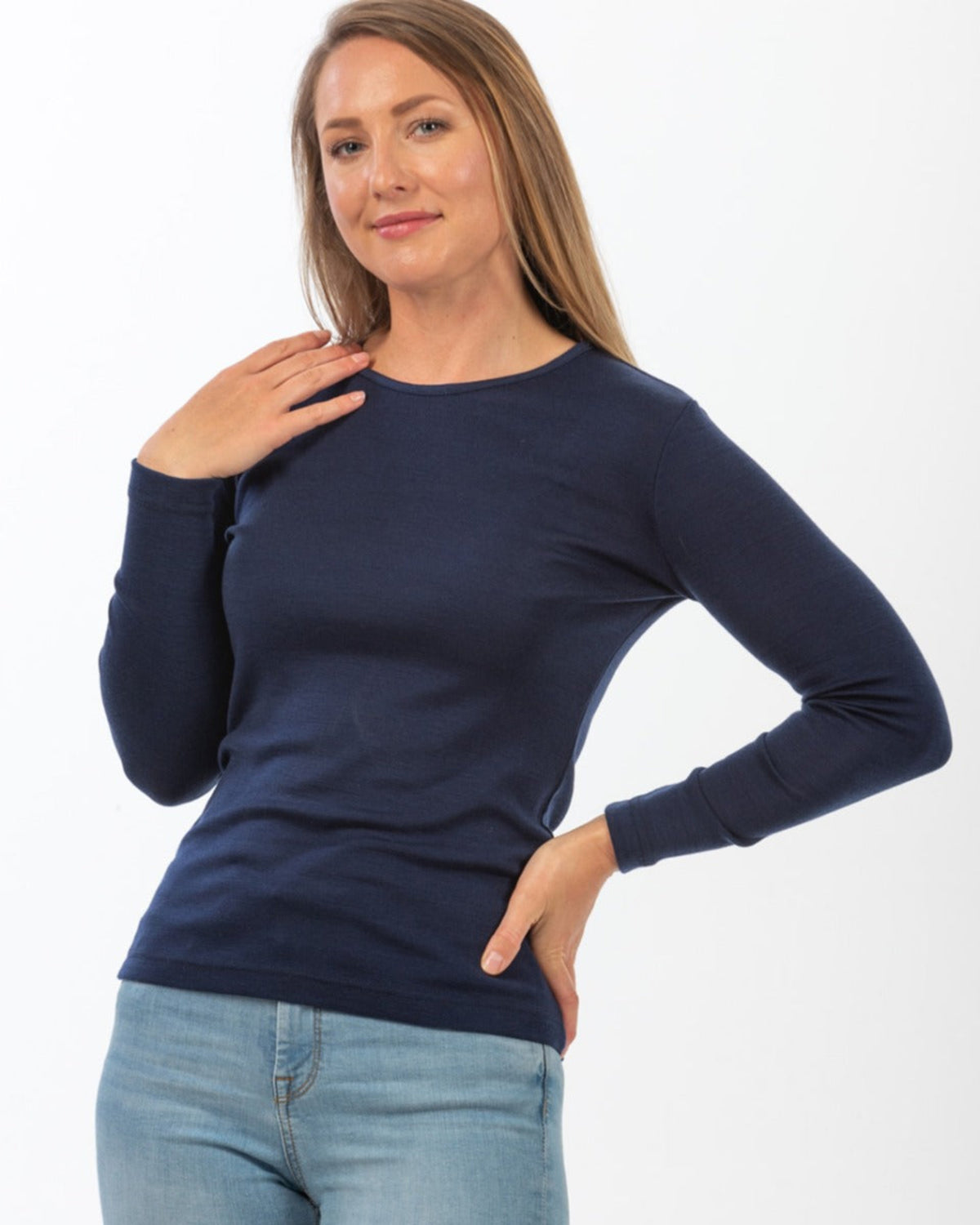 Woman wearing a merino long sleeve crew top