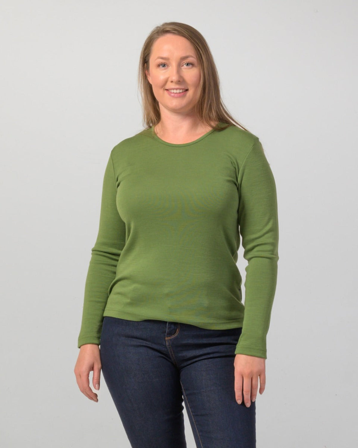 Woman wearing a merino long sleeve crew top