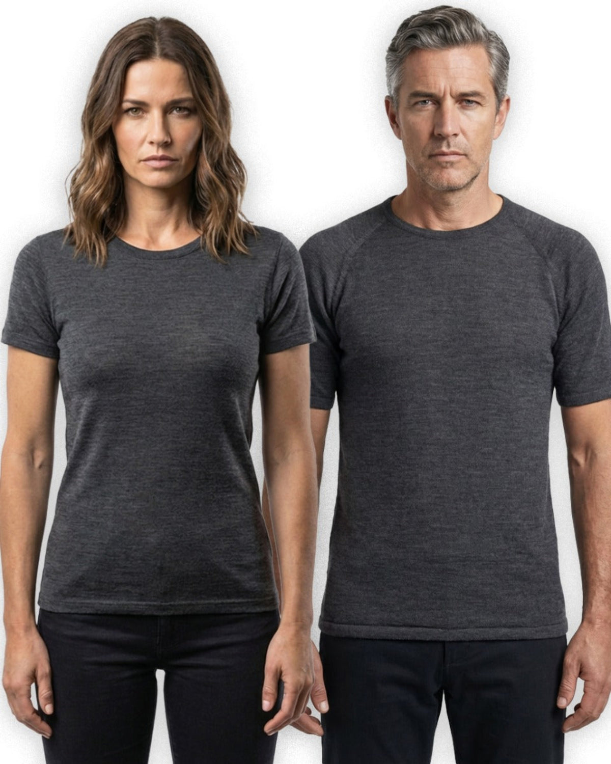 Two people merino wearing dark gray t-shirts against a white background