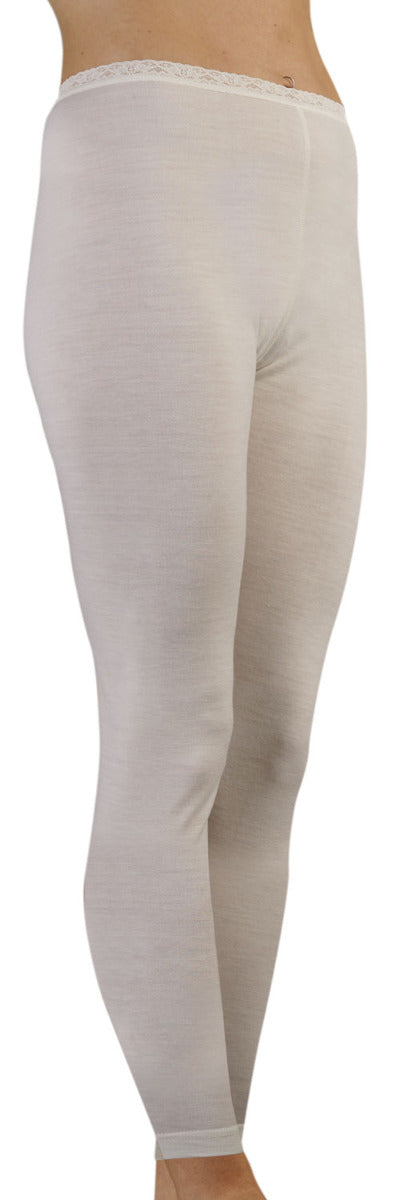 merino white thermal leggings worn by a person on a white background