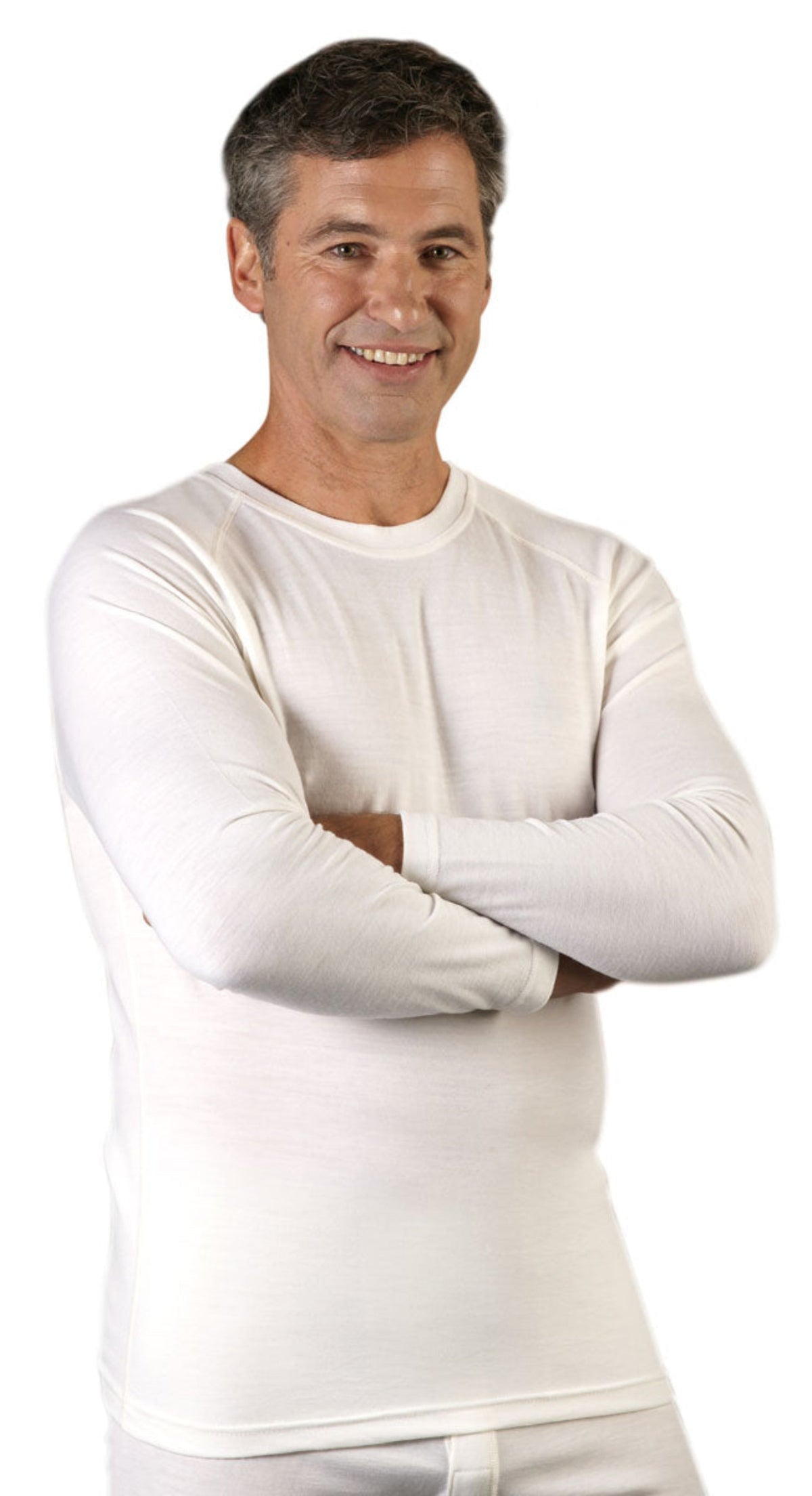 Man wearing a merino white long-sleeve shirt with arms crossed on a white background