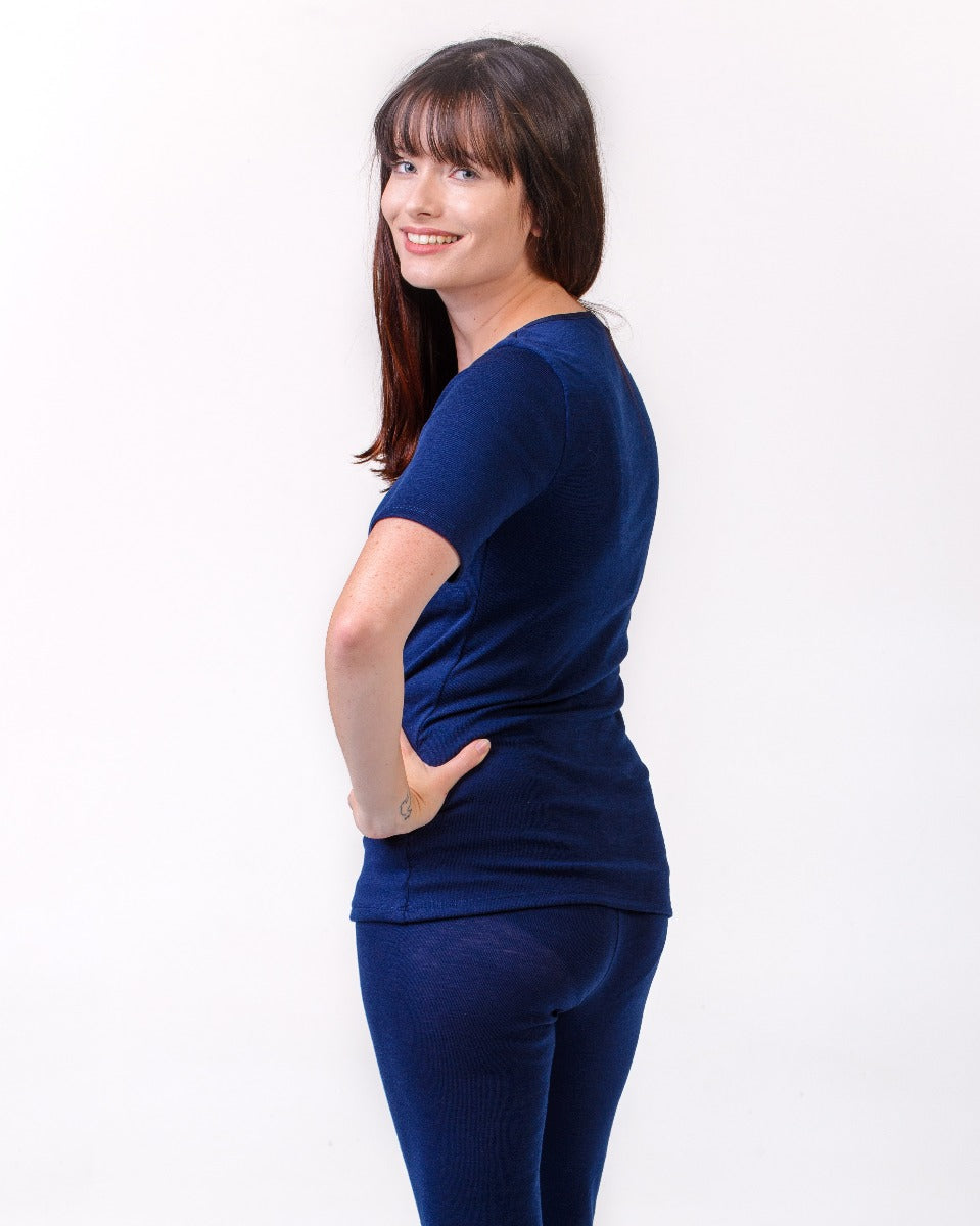 Woman wearing a merino  blue outfit 