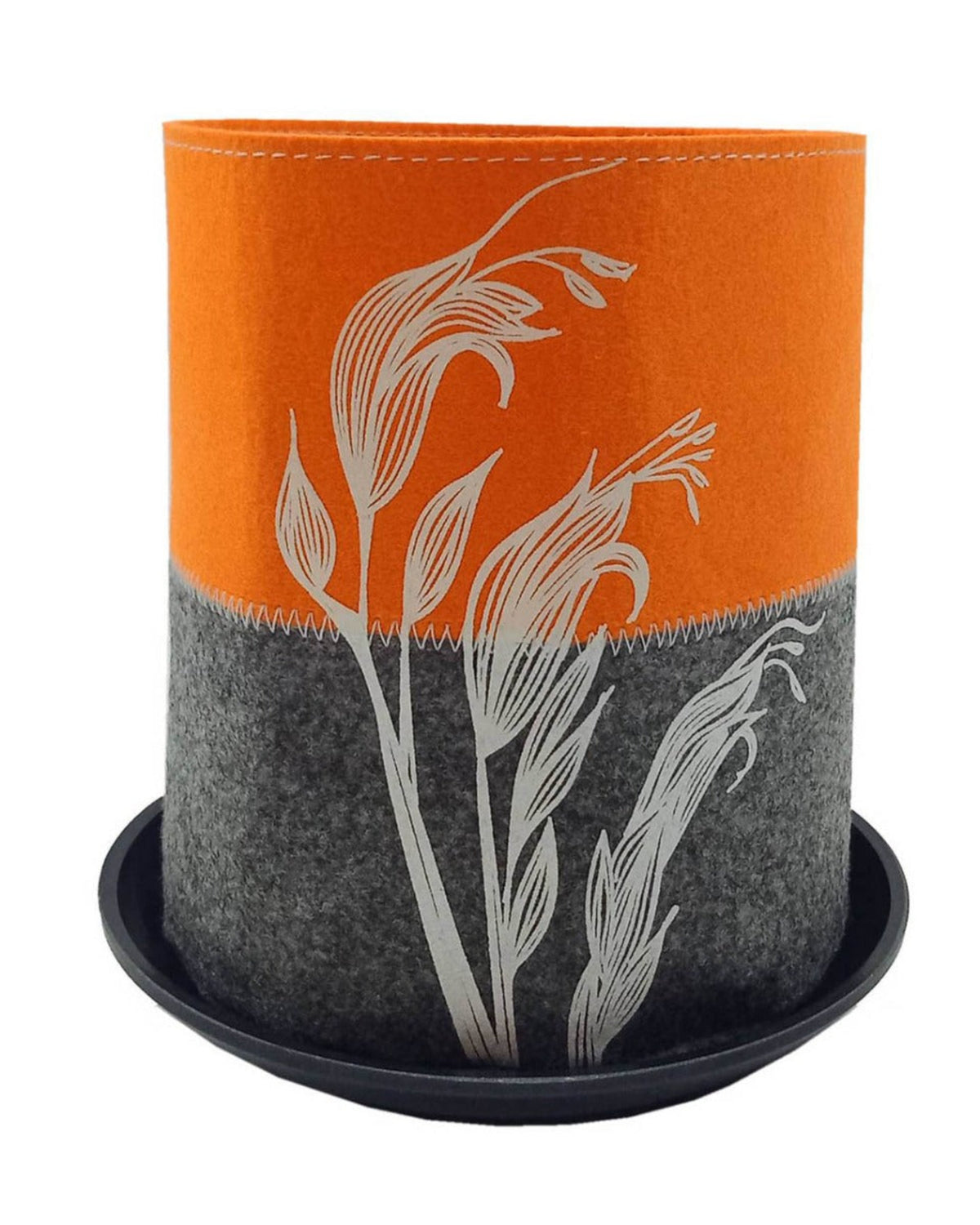ecco grow felt planter Two-toned flower pot with floral design on an orange and gray background
