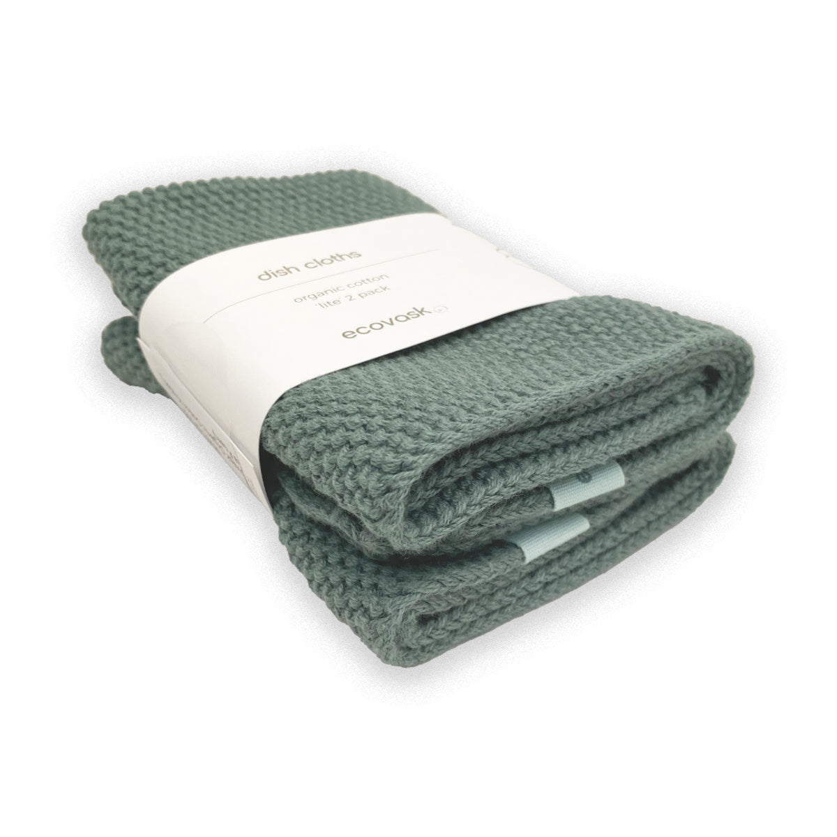 cotton dish cloth Folded green fabric with a white label on a white background