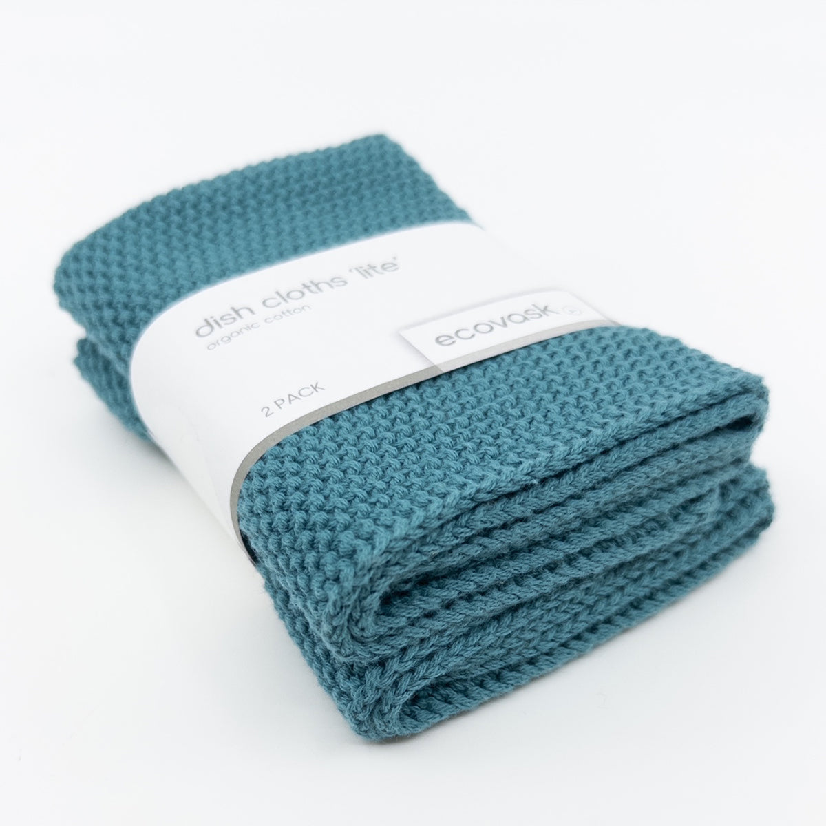 cotto dish cloth Teal dish cloths with a white label on a light gray background