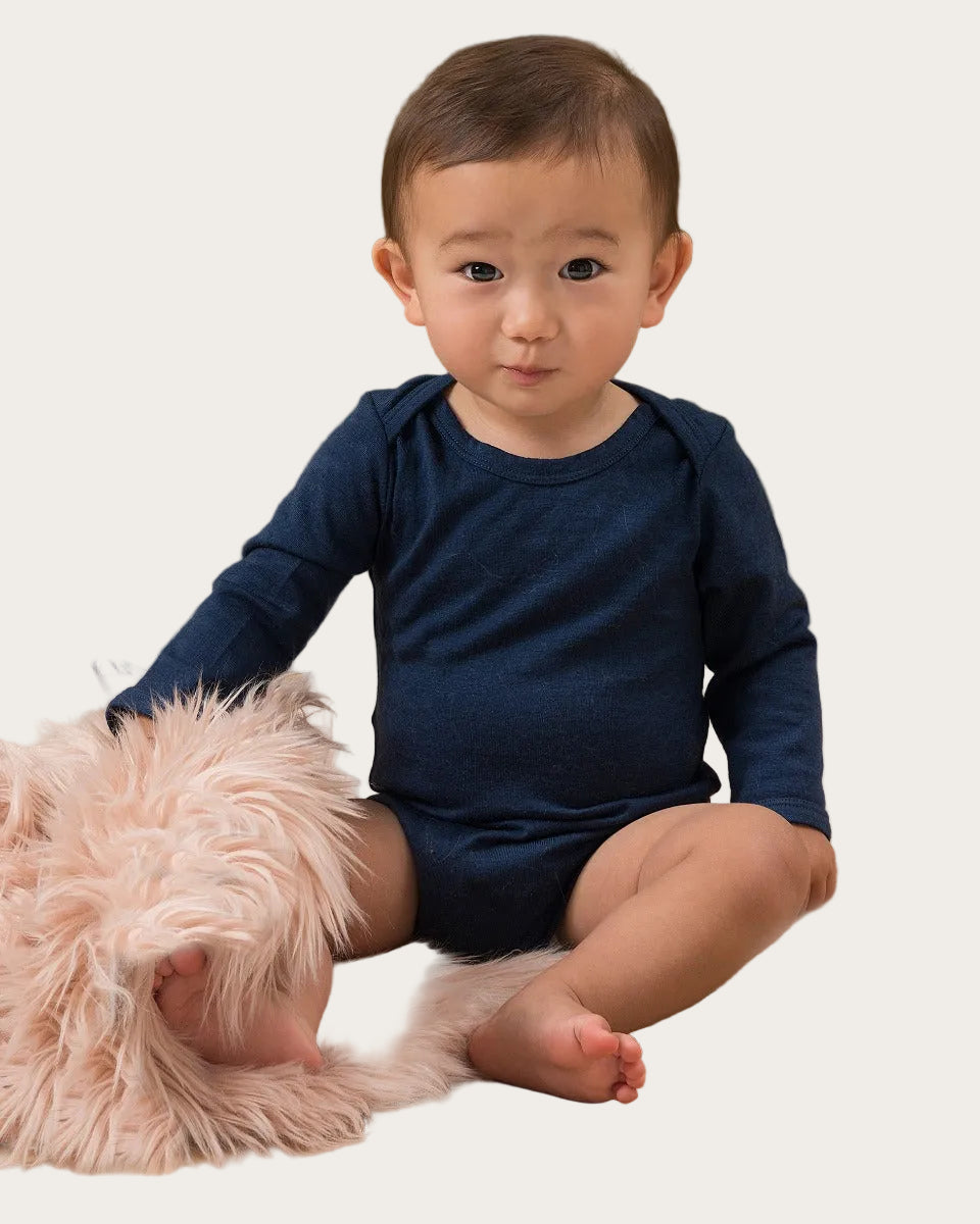 Baby in a navy merino blue outfit 
