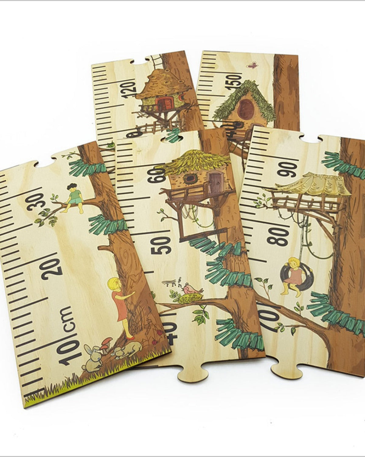 Set of children's growth charts with treehouse design on a white background