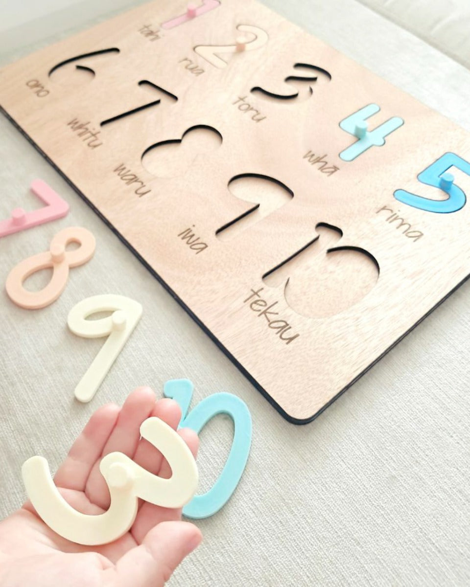 Wooden numbers puzzle with Māori number names