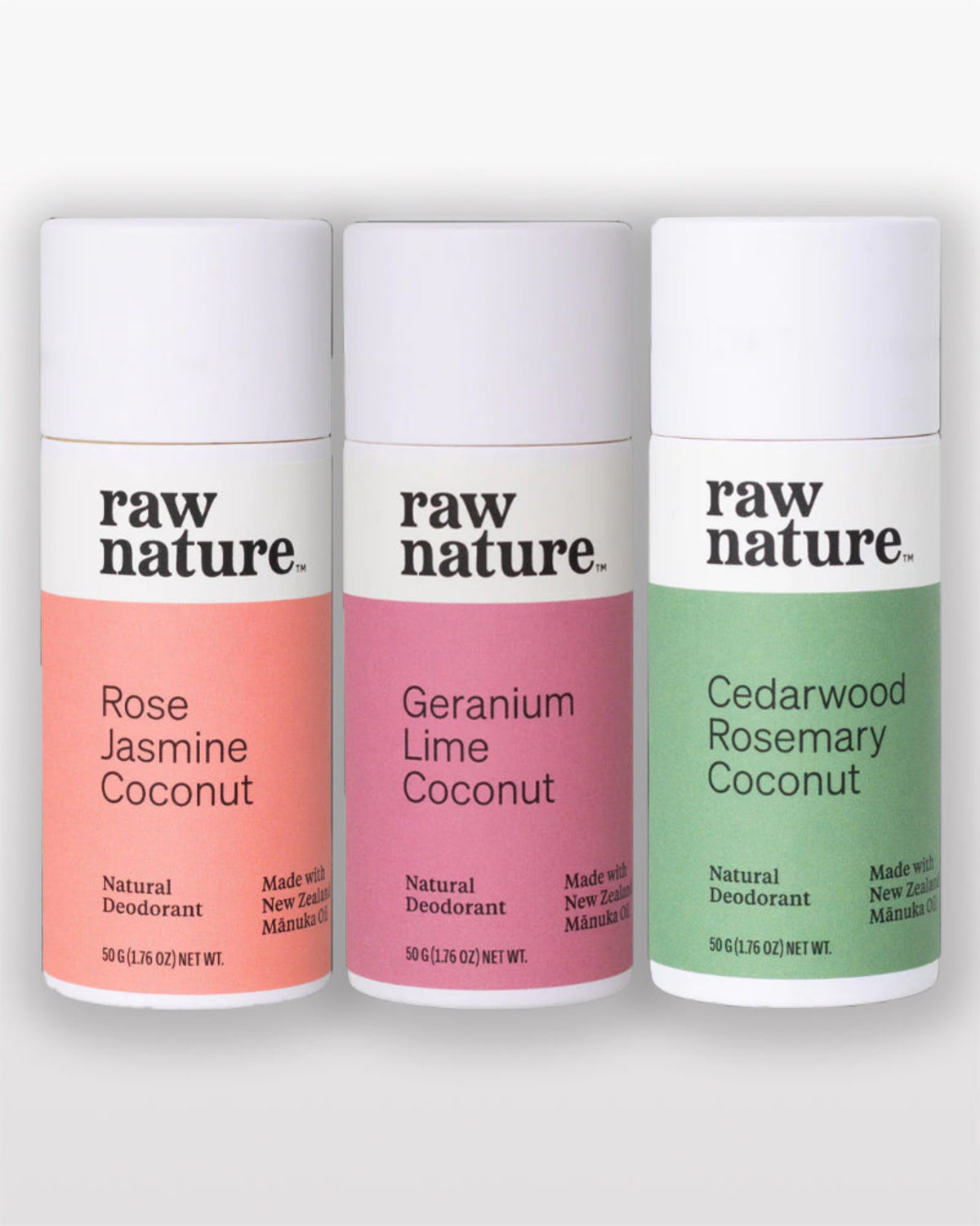 Three Raw Nature deodorant sticks in different colors with names on a white background.