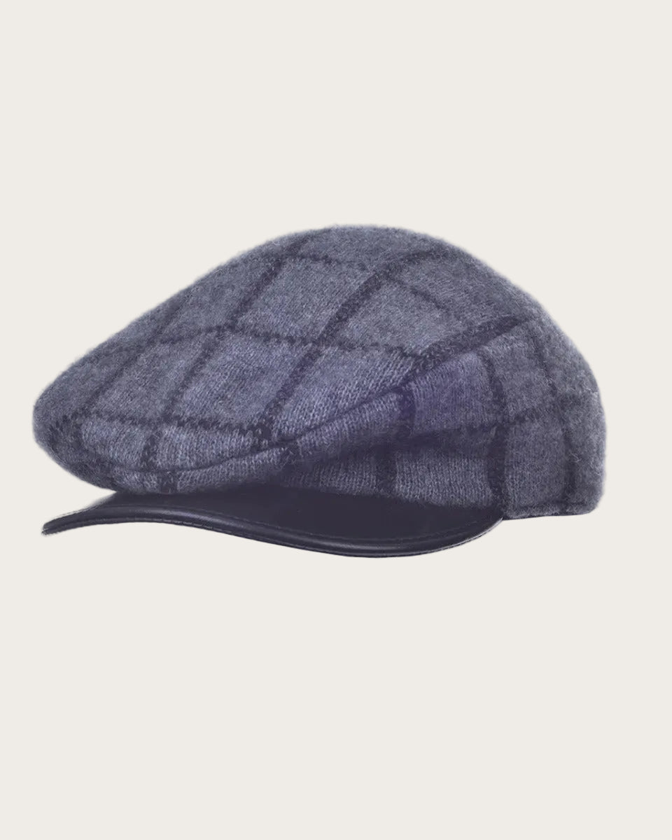 Plaid patterned cap on a white background