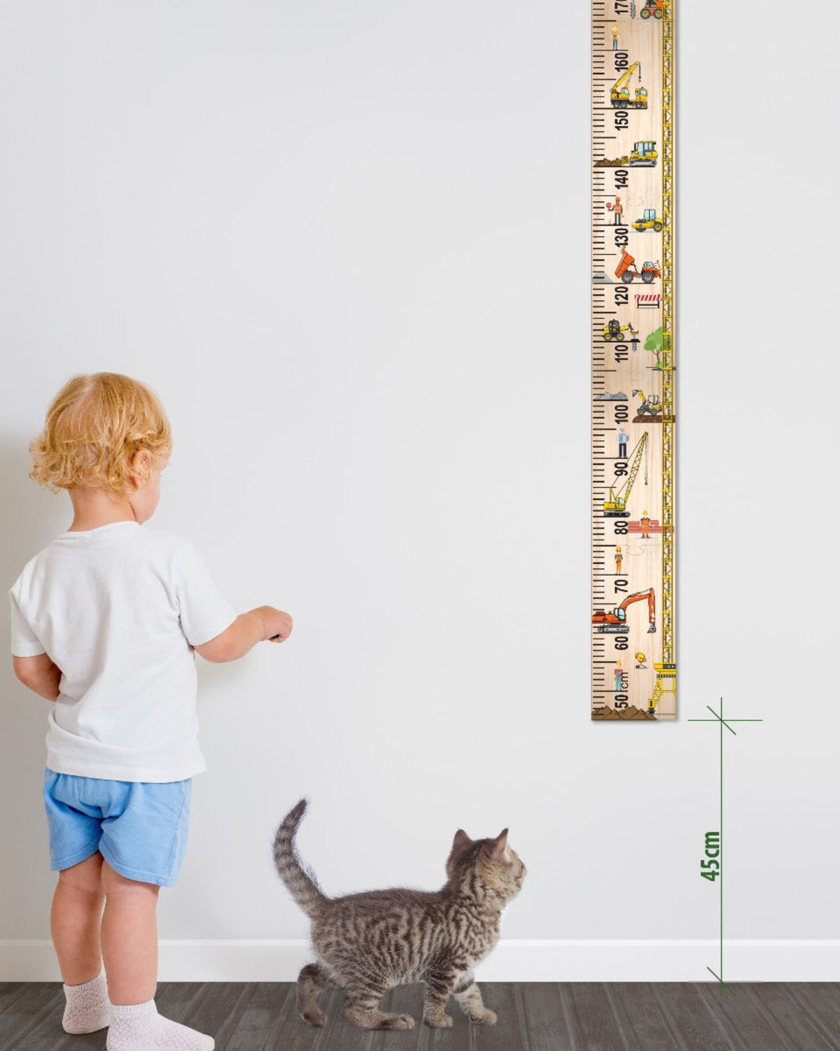 wooden growth chart at a growth chart on a wall