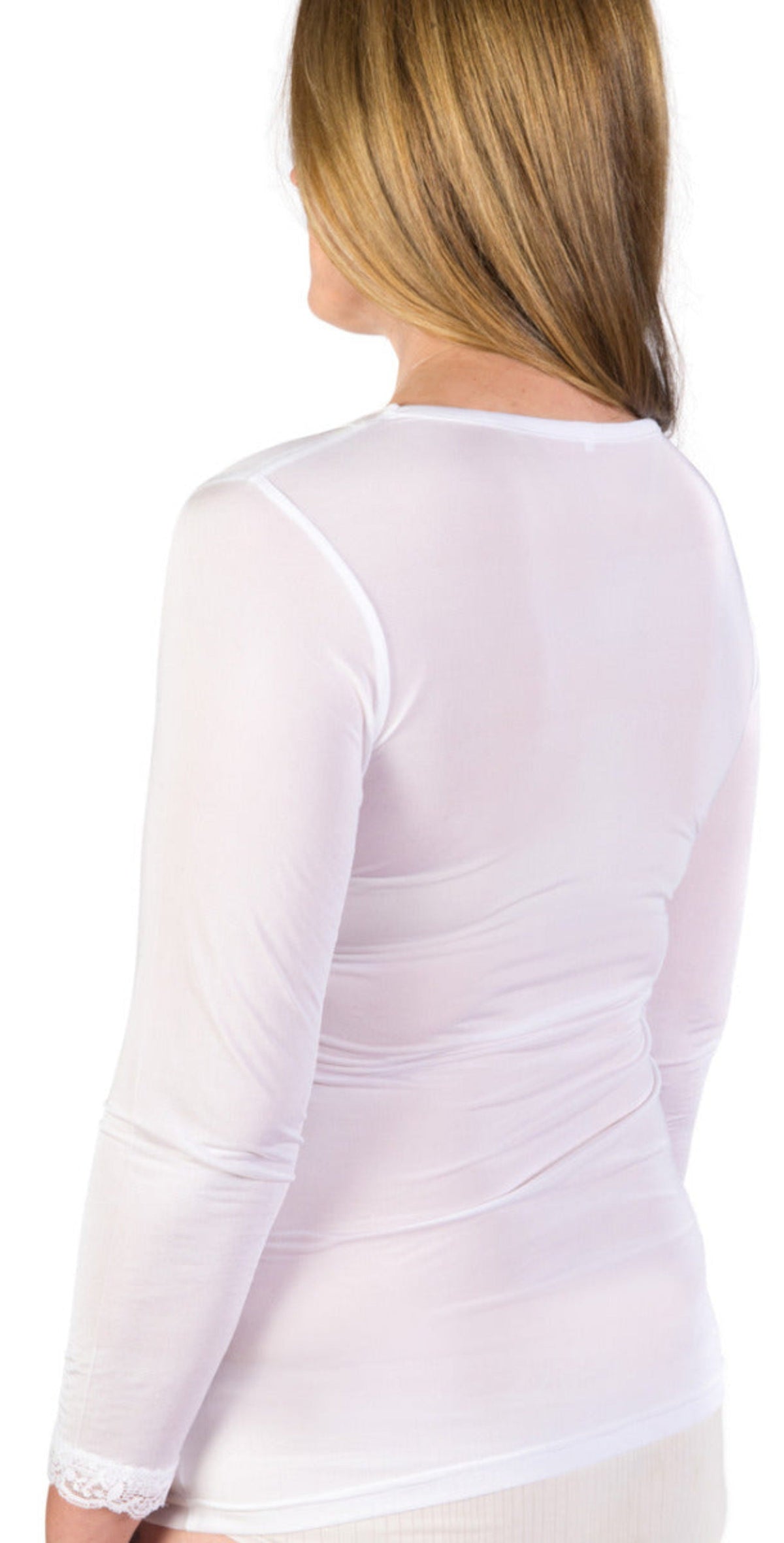 White long-sleeve silk underwear top worn by a person on a white background